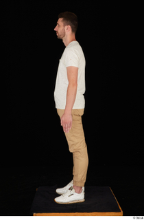  Trent brown trousers casual dressed standing white sneakers white t shirt whole body 0011.jpg